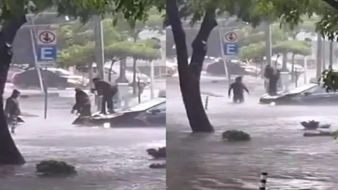 Madre e hijo quedan atrapados en su auto durante inundación en Guadalajara, Jalisco